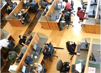 overhead view of people at computer workstations