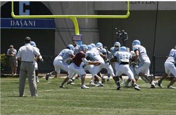 football players in action on the field