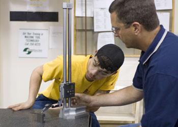 students using precision measurement equipment