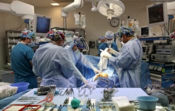 medical team performing surgery in an OR