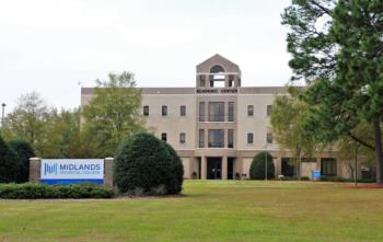 campus building with 'MIDLANDS' sign