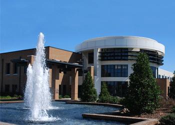 fountain in front of modern building