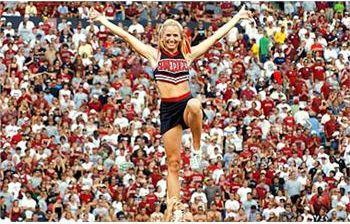 cheerleader performing in front of a crowd