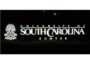 university of south carolina sumter sign at night