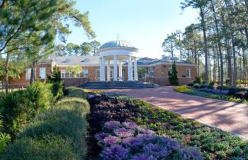 campus building with columns and landscaping