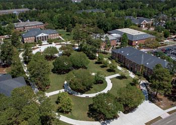 aerial view of campus buildings and lawns