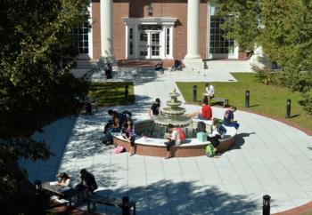 students gathering in busy courtyard