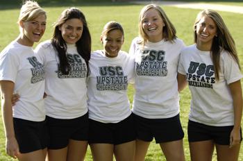 student athletes in shirts with university logo