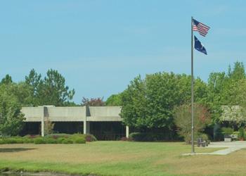 campus building with American flag